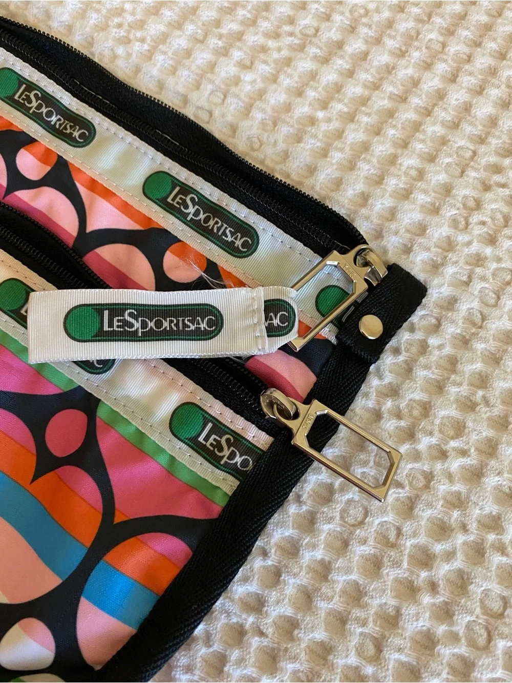 LESPORTSAC 2-Tiered Zip Bag in Vibrant Striped Hearts